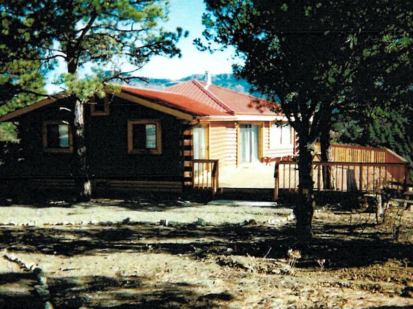 Custom Log Home at Raton Pass Built by Wayne Arnold Excavating, LLC in La Veta and Huerfano County